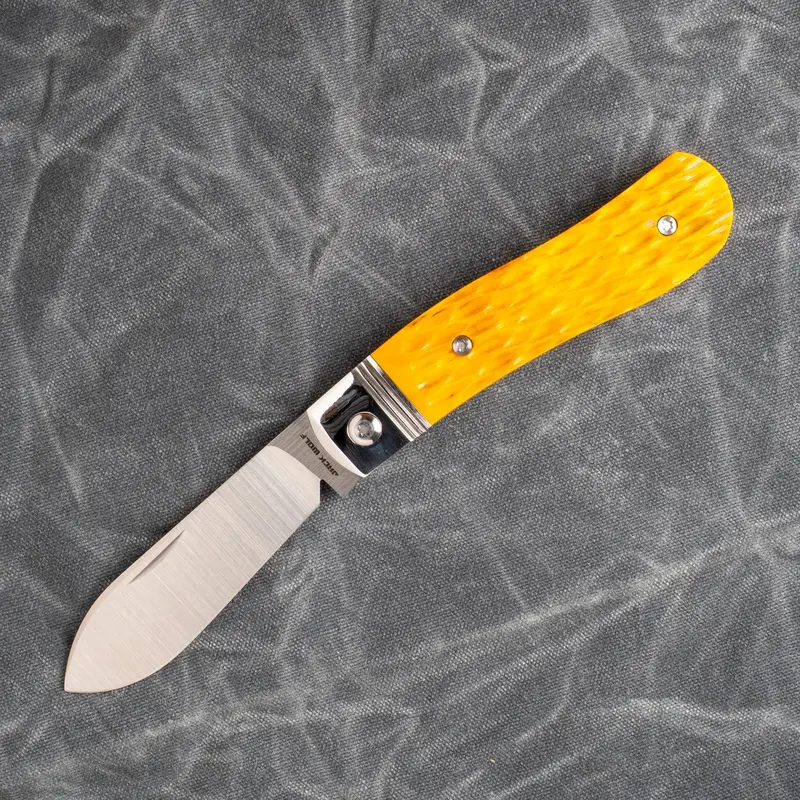 K9 Jack Pocket Knife – Yellow Jigged Bone Handle, Steel Series Build 1