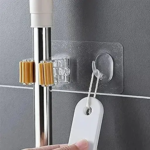 Self-Adhesive Broom Holder – No-Drill Plastic Mount For Mops, Brooms, And Cleaning Tools 1